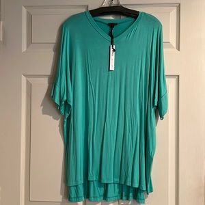 L/XL dolman sleeve tunic. New with tags.